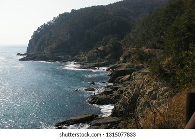 waves breaking into rocks