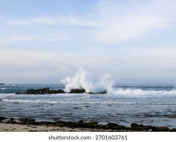 Waves breaking on the rocks