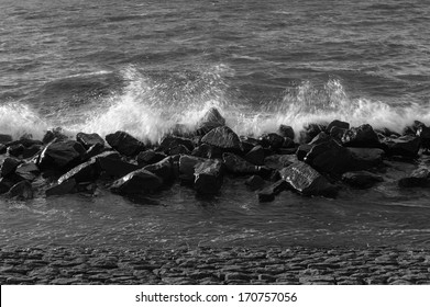 Waves Breaking On The Rocks Of The Ijsselmeer Dam, The Netherlands