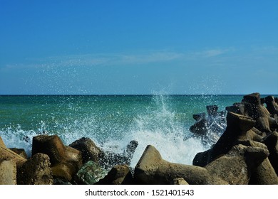 Waves Breaking Through A Concrete Dam