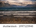waves caused by the wind in Huechulaufquen Lake, near Junín de los Andes, Argentina. Behind, Andes Mountains.