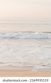 Waves coming in at sunset