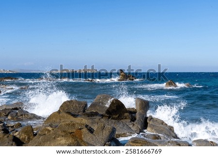 Similar – Image, Stock Photo Waves crashing on the rugged Praia Jalé shoreline