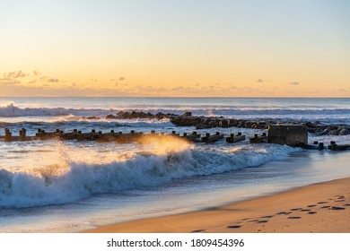 Waves Crashing During Sunrise At Asbury Park Beach