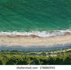 Waves Crashing Onto The Beach Of Duck, North Carolina