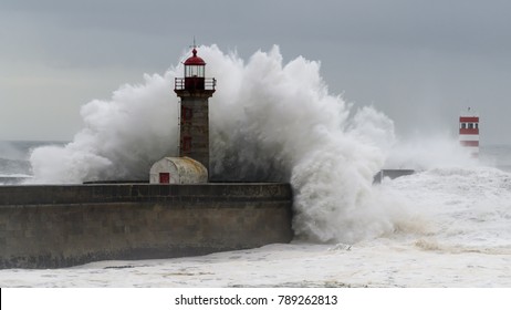 Waves crashing over a lighthouse