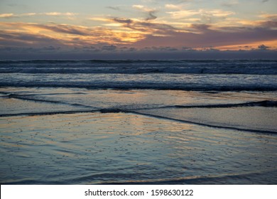 Waves Cross During Sunset Over The Pacific Ocean.

La Jolla, CA, USA.