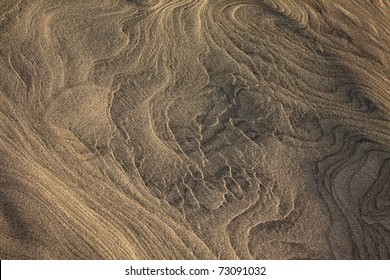 Waves And Curves On Desert Sand Texture