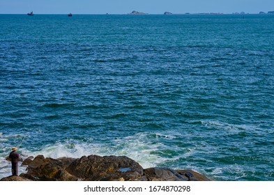 The waves dashed on the rocks