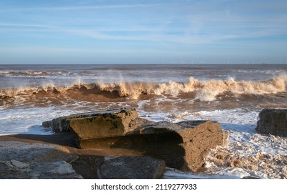 Waves heading towards a beach
 - Shutterstock ID 2119277933