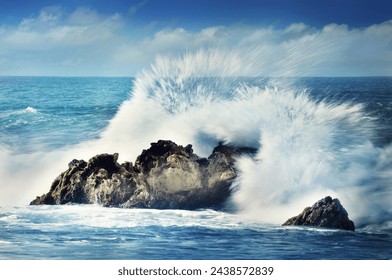 The waves hit the rocks, with several different views, symbolizing the never-ending spirit - Powered by Shutterstock