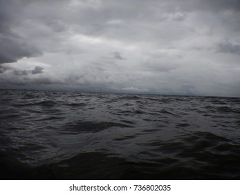 Waves In The Ocean In A Cloudy Day