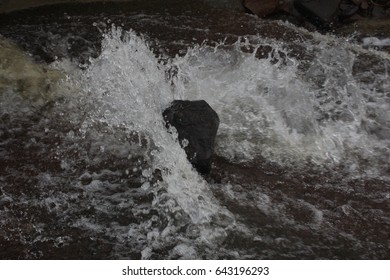 Waves on a rock