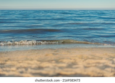 Waves On The Seashore And Sunny Weather