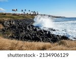 Waves of the Pacific Ocean crashing on Old Coast Guard Beach in the north of Big Island, Hawaii - Rocky shore in the Kohala Historical Sites State Monument