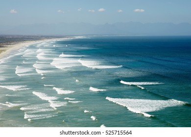 Waves rolling on sandy beach