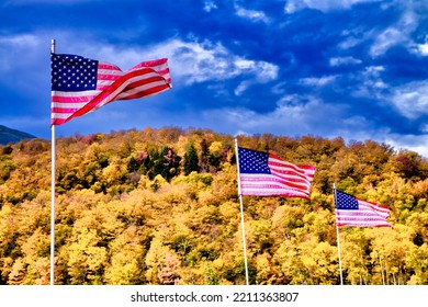 Waving American Flags In New England, Autumn Foliage Season With Orange Colors And Blue Sky.