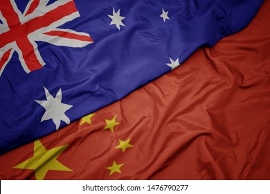 Waving Colorful Flag Of China And National Flag Of Australia. Macro