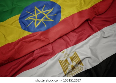 Waving Colorful Flag Of Egypt And National Flag Of Ethiopia . Macro