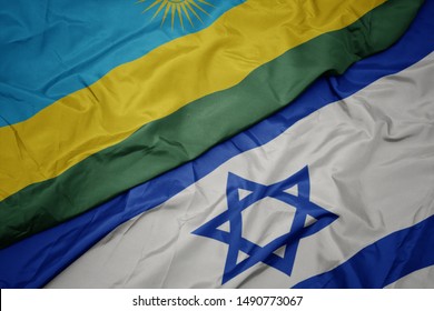 Waving Colorful Flag Of Israel And National Flag Of Rwanda. Macro
