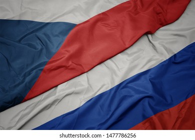 Waving Colorful Flag Of Russia And National Flag Of Czech Republic. Macro