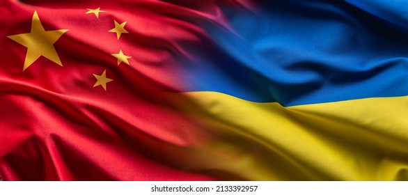 Waving Flag Concept Of Ukraine And China Symbolising Political Connection.