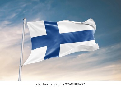 Waving flag of Finland in beautiful sky. Finland flag for independence day. The symbol of the state on wavy fabric.
