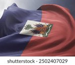 Waving Flag of Haiti in Blue Sky. Haiti Flag on pole for Independence day. The symbol of the state on wavy fabric.