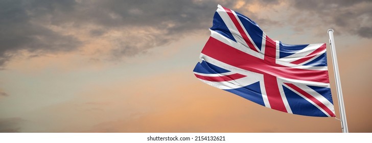 Waving the flag of the United Kingdom. Illustration of a European country flag on a flagpole in red and white colors.uk flag Queen Elizabeth II - Shutterstock ID 2154132621
