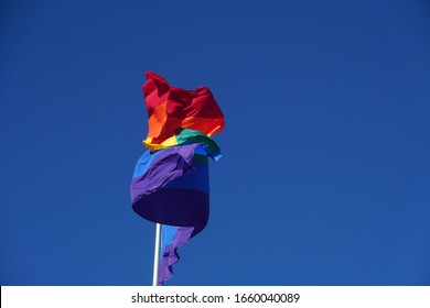 Waving LGBT pride flag or Rainbow flag . 