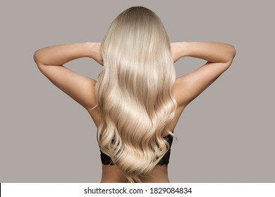 wavy blond hair back view