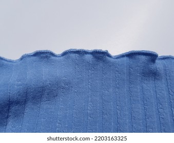 Wavy Blue Jersey With A Wavy Border Along The Edge - On A White Background (macro, Elastic Band Width - 5 Mm, Texture).