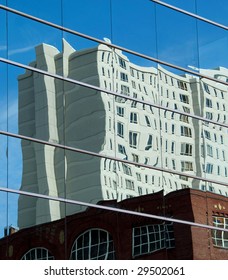 Wavy Building Reflection in Office Building Windows