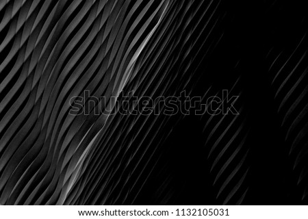 Wavy dark gray texture. Reworked close-up photo of wall surface. Grunge abstract black and white background on the subject of modern interior, architecture or technology.