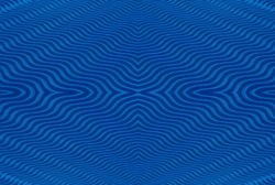 A Wavy Fluted Piece Of Blue Cardboard Creates An Interesting, Hypnotic Abstract Pattern.