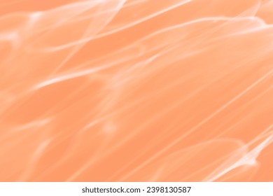 Wavy lines of light as Abstract background peach colored, natural flare from lights, trend color year 2024 peach fuzz monochrome photo with optical effect, blur texture as holiday backdrop, wallpaper