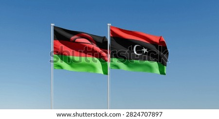 Wavy Malawi and Libya Flags and Clear Blue Sky
