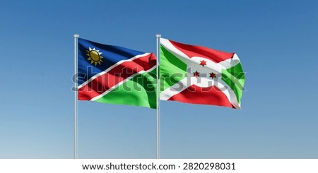 Wavy Namibia and Burundi Flags and Clear Blue Sky