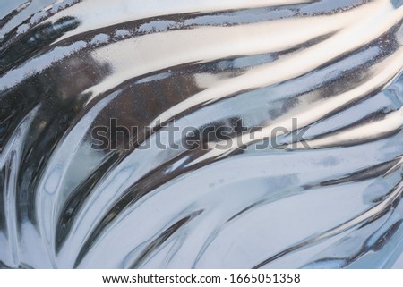 wavy pattern in ice close up
