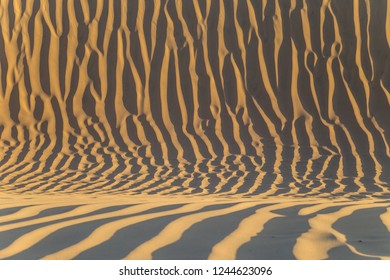 Wavy pattern on sand dunes created by wind