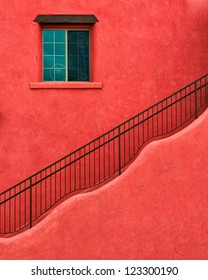 Wavy Stairs On Adobe Red Building