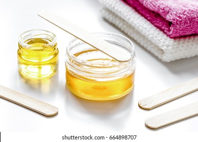 wax for depilation on white background
