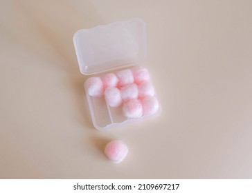 Wax Earplugs Are Wrapped In Cotton And Lie In A Box. No People.