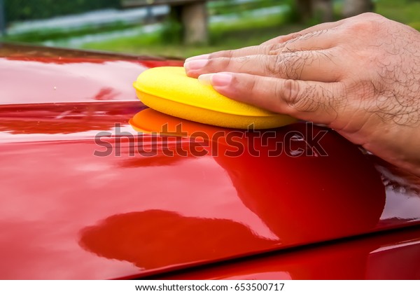 Wax sponge for waxing the\
car.