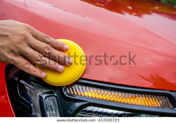Wax sponge for waxing the\
car.