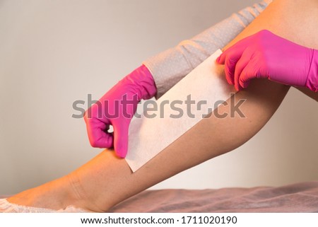 wax strips leg to remove unwanted hair medium