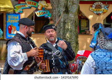 Waxahachie, Texas / USA - 11 May 2019 Scarborough Renaissance Festival
Men And Women In Scottish Costumes Enjoying The Day In The Village.