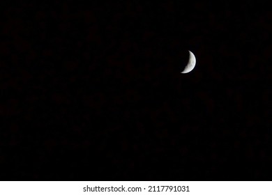 waxing crescent moon moving from new moon to first quarter phases at night