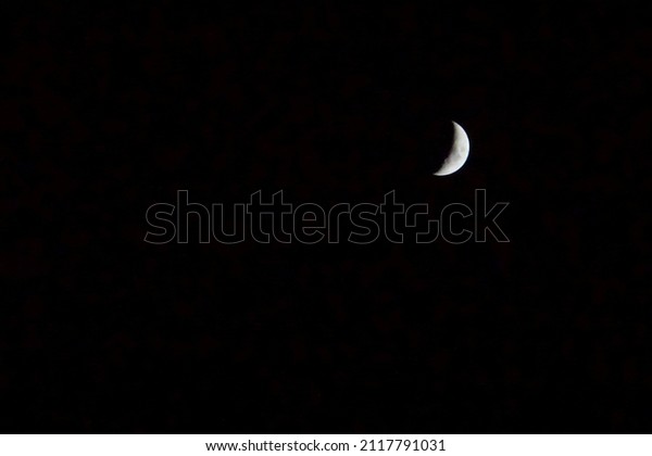 waxing crescent moon moving from new moon to first\
quarter phases at night