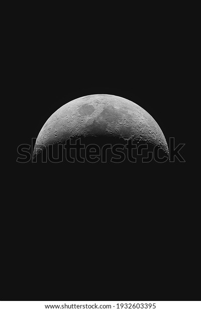 Waxing crescent moon as seeing from the\
southern hemisphere. Amazing the moon rough surface full of craters\
from meteorites coming from the universe and crashing our satellite\
the Moon an awe\
relief\
\
